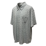 greenbpatterned short-sleeve shirt on a white background
