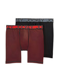 Two pairs of Jockey boxer briefs, one red and one black, on a light gray background.