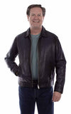 Man wearing a dark leather jacket over a gray shirt on a white background
