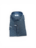Folded blue patterned shirt with a brand label on a white background
