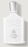 a white bottle of creed silver mountain water cologne 