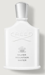 a white bottle of creed silver mountain water cologne 