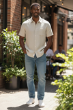 man standing in walk way