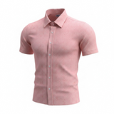 Pink short-sleeve shirt on a white background