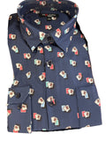 Blue shirt with colorful pattern on a wooden surface