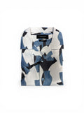 Folded shirt with abstract pattern on a white background