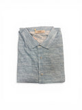 Folded blue and gray striped shirt on a white background