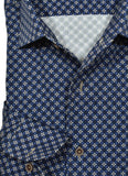 Blue patterned shirt with a close-up of the collar and buttons.