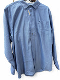 Blue patterned shirt on a hanger with a white background