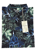 Floral patterned shirt with a tag on a wooden surface