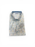 Folded patterned shirt on a white background