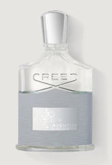 Creed Aventus perfume bottle on a light gray background