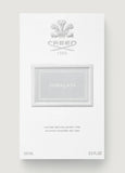 Creed Himalaya perfume packaging on a light gray background