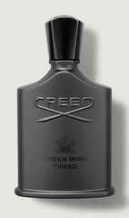 Creed Green Irish Tweed perfume bottle on a light gray background