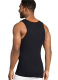 Man wearing a black tank top against a plain background