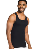 Man wearing a black tank top against a plain background