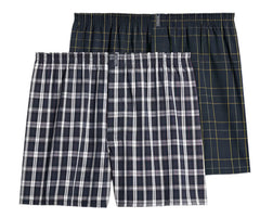 Two pairs of checkered boxer shorts on a light gray background