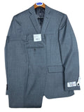 Gray suit jacket on a wooden surface with tags attached