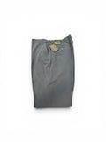 Folded midnight pants with a tag on a white background