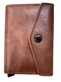 A brown leather wallet with a flap closure and snap button, featuring the brand name 'Secured' embossed on the side, displayed on a light wood background.