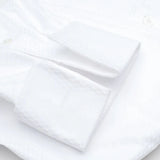 a tonal French cuff white shirt