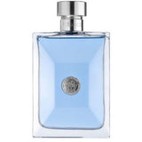 Versace pour home Perfume bottle with a blue glass body and silver cap on a white background