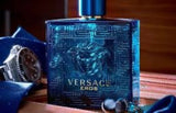Versace Eros perfume bottle with intricate design on a wooden surface