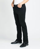 side view of man wearing black jeans in white shirt