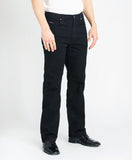 man wearing black jeans side view